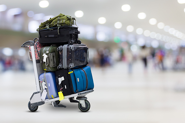 luggage on a baggage cart