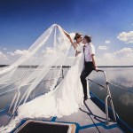 bride and groom on a boat