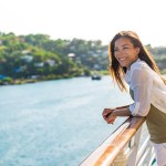 woman smiling aboard a river cruise ship