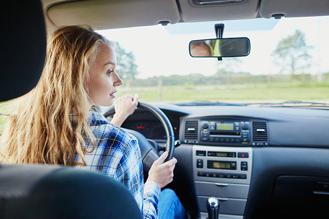 teen driver making a turn