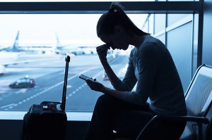 travel safety - women is stressed at the airport