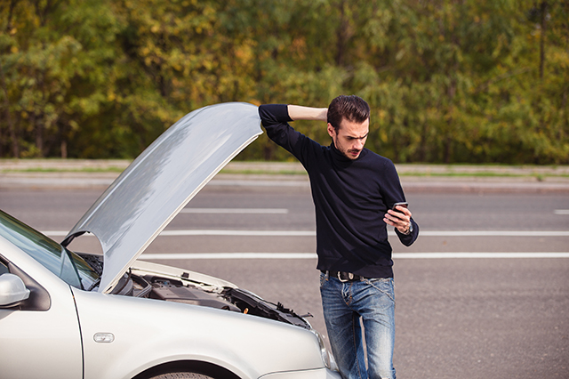 car breakdown - driver is stranded on the side of the road