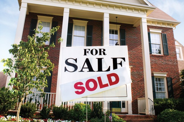 For Sale Sign in front of house - When Should I List My House?