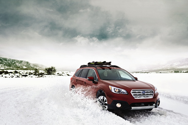 2017 Subaru Outback driving in the snow