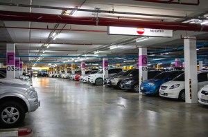 various cars in packed in a parking lot