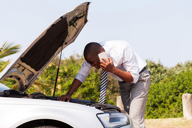 man on the phone with roadside assistance