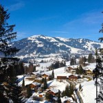 Chalets in a snowy valley in Gstaad, Switzerland