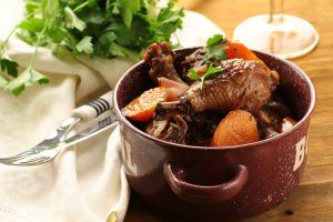 Coq au vin in France.