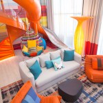 A two-story family suite, with a slide, is one way example of how the cruise industry is upping its game for travelers.