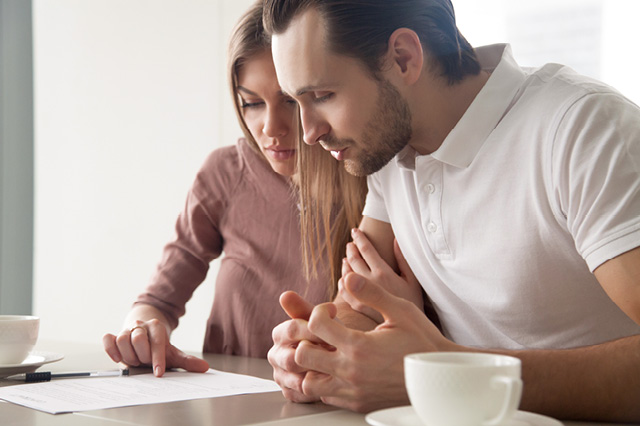 Couple looking at paperwork