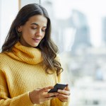 woman using phone for good