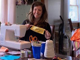 Stacie Harvey at her sewing machine