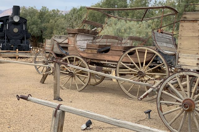 An old wagon and train locomotive