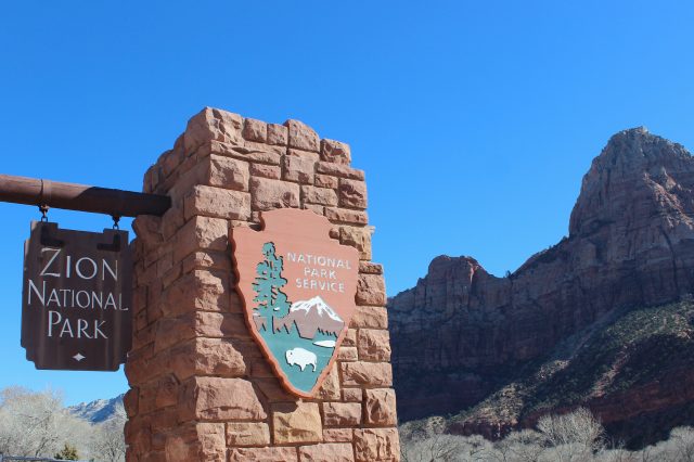 Zion sign on an orange brick tower