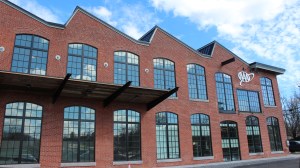 Red brick building with jagged roof