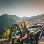 rental car insurance - woman sightseeing