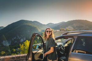 rental car insurance - woman sightseeing