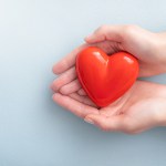 hands with red hear - life insurance payout