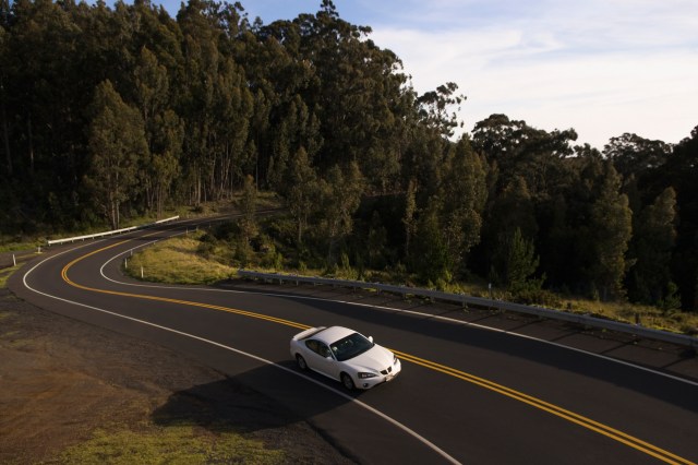 renting a car under 25 - car on winding road. 
