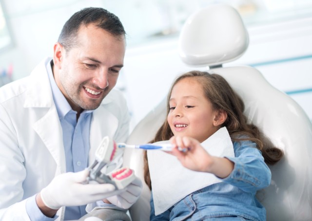 little girl at dentist