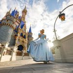 Cinderella poses in front of Cinderella Castle inside Magic Kingdom Park at Walt Disney World Resort in Lake Buena Vista, Fla. (Matt Stroshane, Photographer)