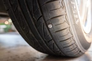 when to replace tire - nail in tire