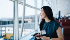 UK ETA - woman at airport