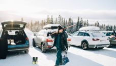 beginner ski resorts - skier in parking lot