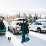 beginner ski resorts - skier in parking lot