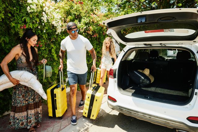 family loading car