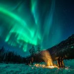 Viewing the northern lights in Anchorage. Courtesy of Judy O. Photo.